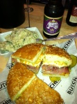 A well constructed and tasty muffaletta, Cajun potato salad and an Abita beer at Cochon Butcher. 