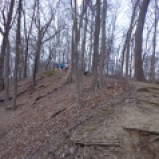 Several runners can be seen on the crest of Golf Hill on the first lap of the 50 miler.