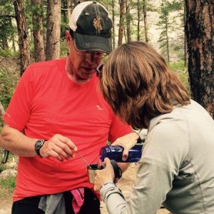 My wife, Barb, pours me some chicken noodle soup at the Foot Bridge Aid Station, mile 18 in the Bighorn 52.